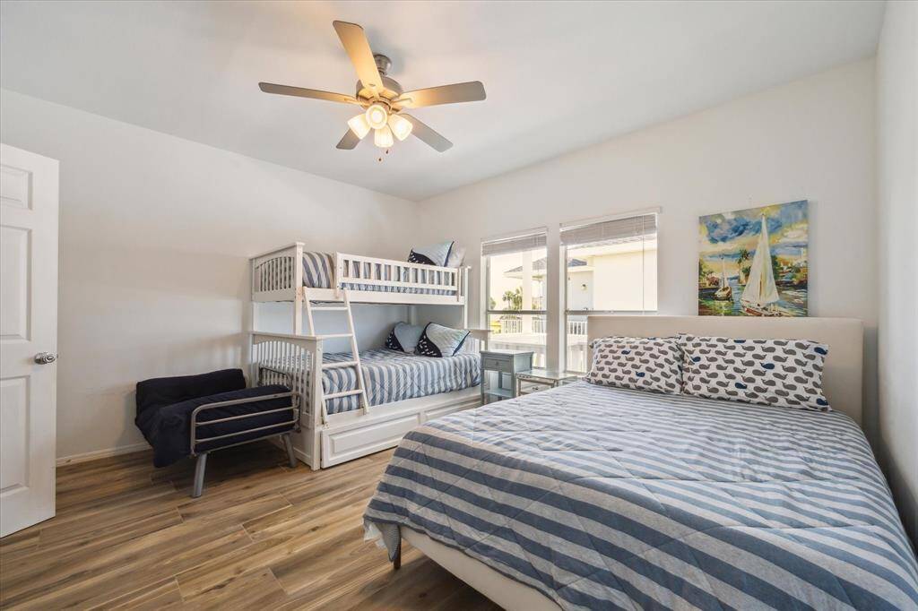 An additional secondary bedroom on the first floor. This spacious room features private access to the bathroom.