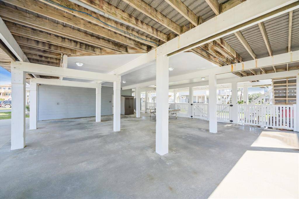 Ample flex space for extra cars, a boat or shady space for toys and kids to play.  This space has several possibilities.