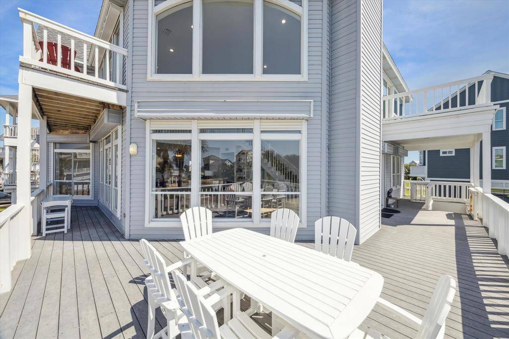 Amazing spacious outdoor deck with both sunny and shaded areas, perfect for relaxing or enjoying alfresco dining.