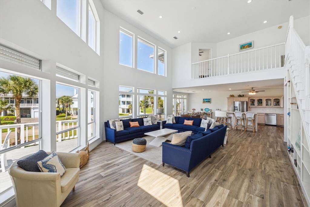 Light, bright, spacious and airy!  The owner's updates are truly welcoming and provide that "coastal" atmosphere. Plenty of space to entertain and the home has a fabulous flow from the living room through the kitchen to the dining room.