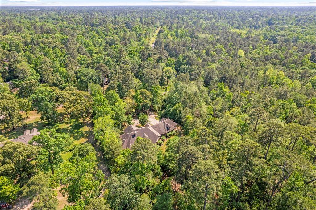 Ariel view of the back of the home, looking south towards FM 1488 and Magnolia.