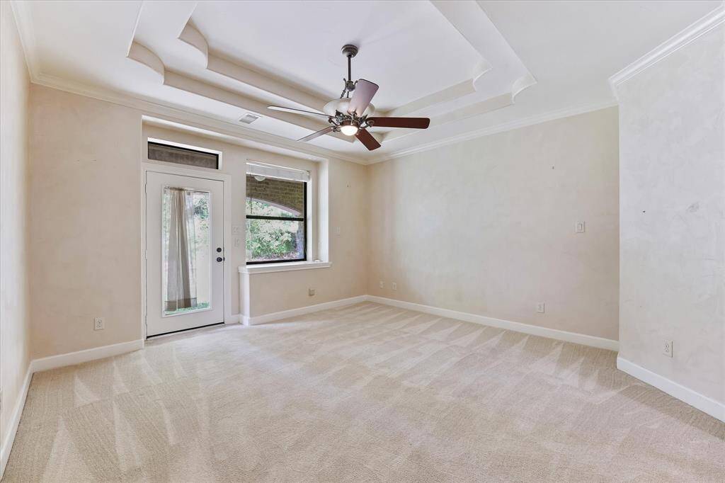 The primary suite has plenty of room for all your bedroom furniture.