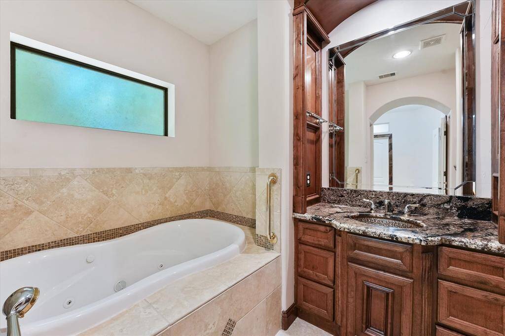 The jetted tub in the primary ensuite is perfect to soak away all your stress!