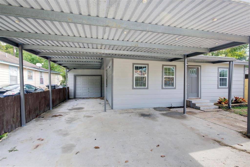 1 car garage + carport large enough for 3 vehicles