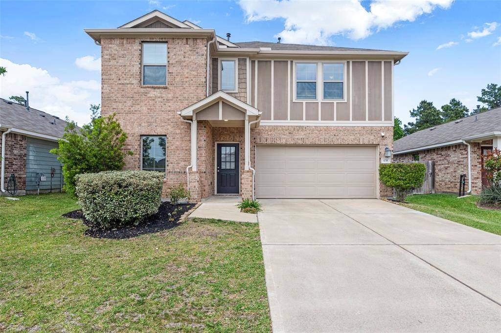 Charming two-story brick home with a double garage, well-maintained front lawn, and a welcoming entrance. Ideal for a family seeking a spacious and stylish residence.
