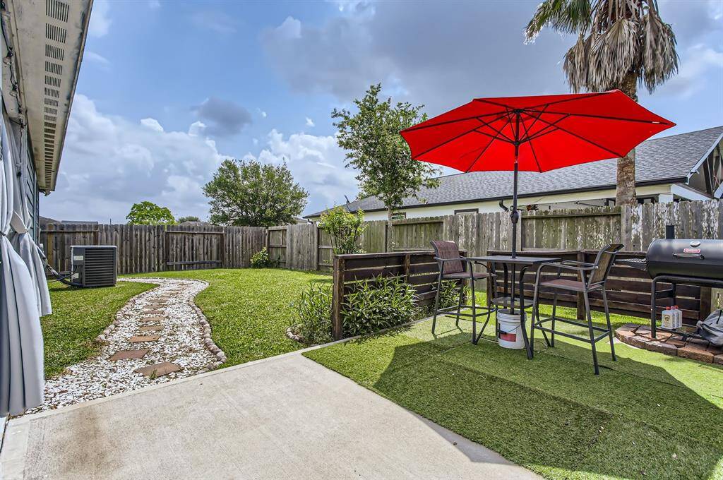 The patio has been extended out and around the side of the house, creating space for mutliple gathering areas