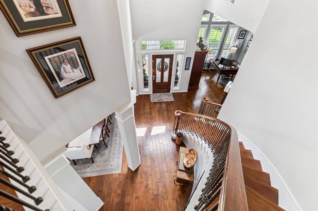 Traveling up the stairway to 4 additional bedrooms, 3 baths, game room and study nook.