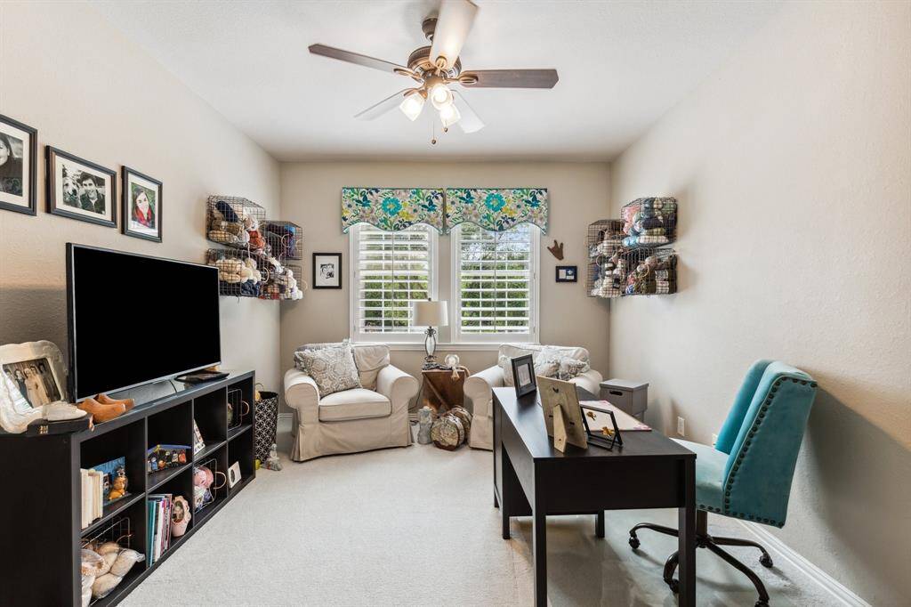 4th bedroom (currently used as a hobby room) has new carpet, ceiling fan, double windows covered with plantation shutters. Large walk-in closet services this room.