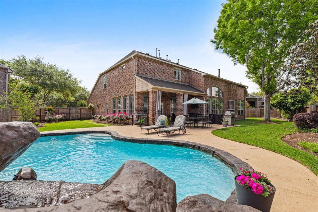With new pool equipment and resurfacing this pool is practically new! Notice that the entire home is bricked. You don't see that very frequently. Quality shows!