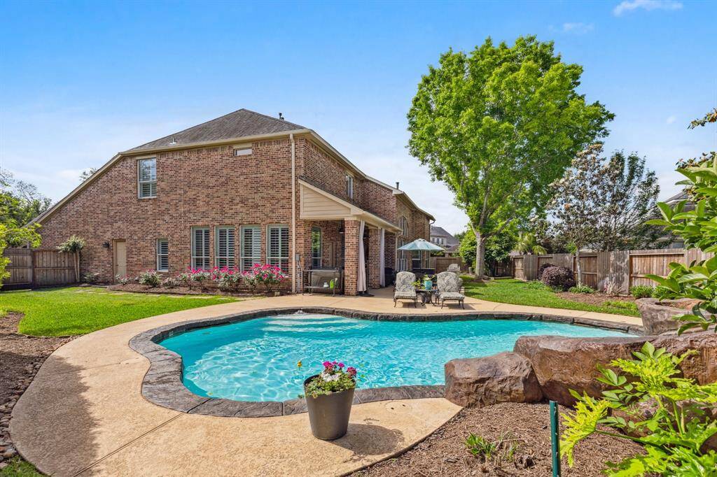 Fountain and cleaning pumps have also been updated. The side yard is enormous and allows for play space or a herb garden that captures the west sun. Fence is new on three sides so no worries about replacement anytime soon.