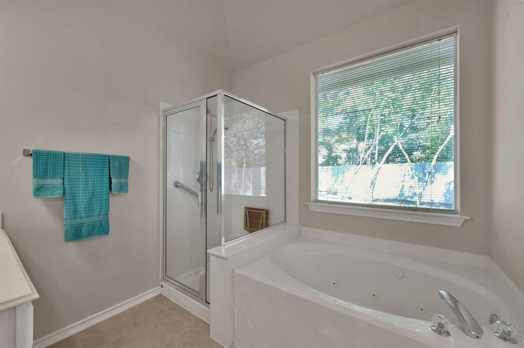 Relax the day away in this large soaking tub.