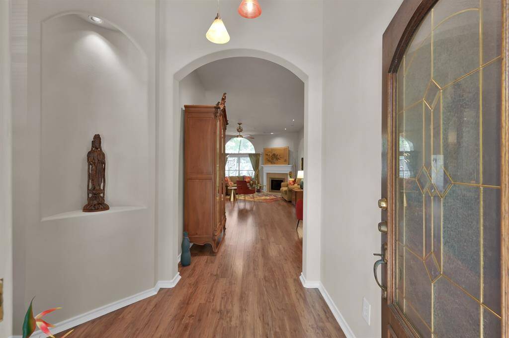 This home is warm and inviting - with wood flooring and fresh paint throughout.