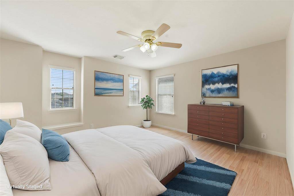 Secondary bedroom closet with Tons of Natural Light (Virtually Staged)