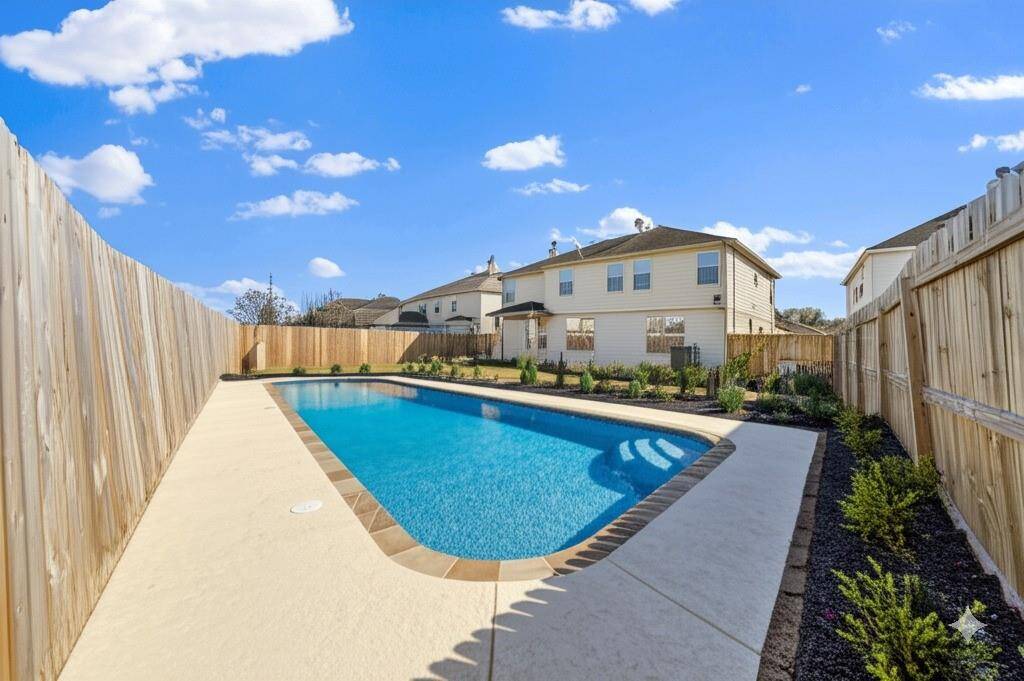 Larger lot with no rear neighbor! Excellent for privacy and flexibility. Lot has a easy to utilize shape. (Grass is digitally enhanced)