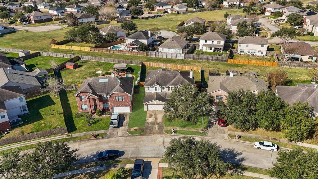 Larger lot with no rear neighbor! Excellent for privacy and flexibility. Lot has a easy to utilize shape. (Grass is digitally enhanced)