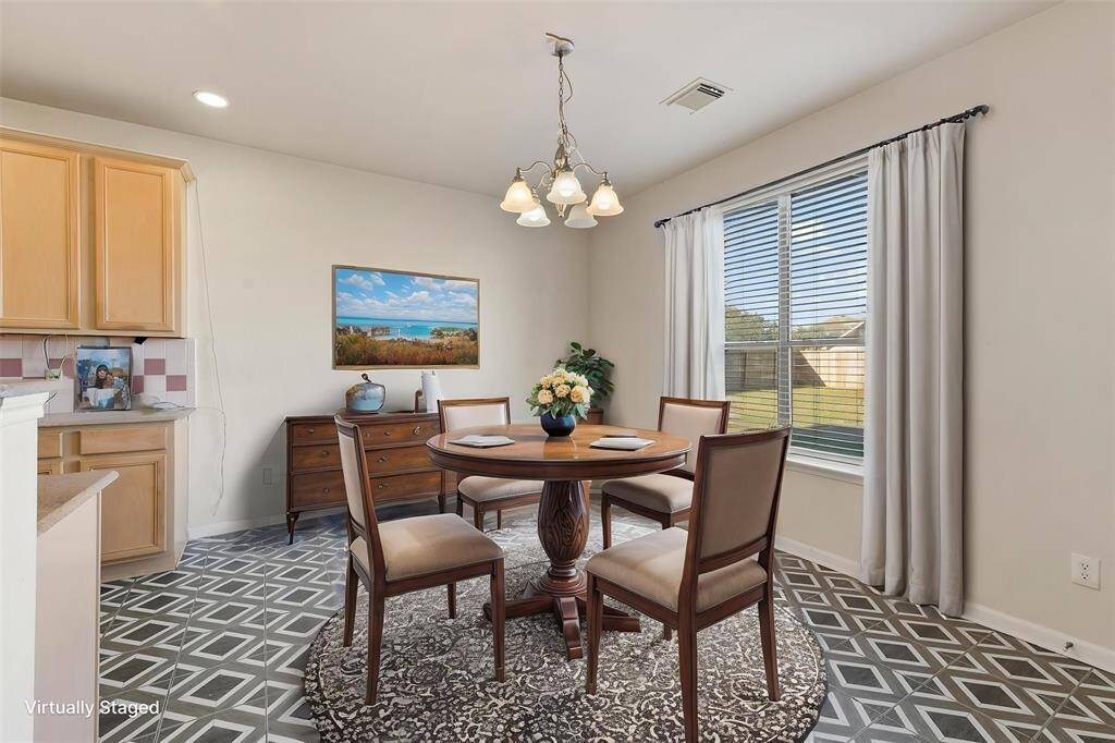 Breakfast area beside the kitchen (Virtually Staged)