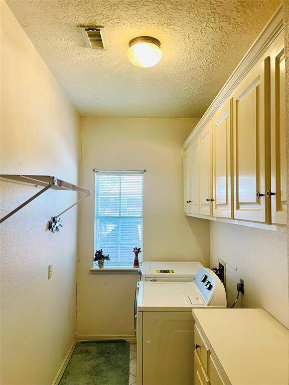Laundry w window and iron desk