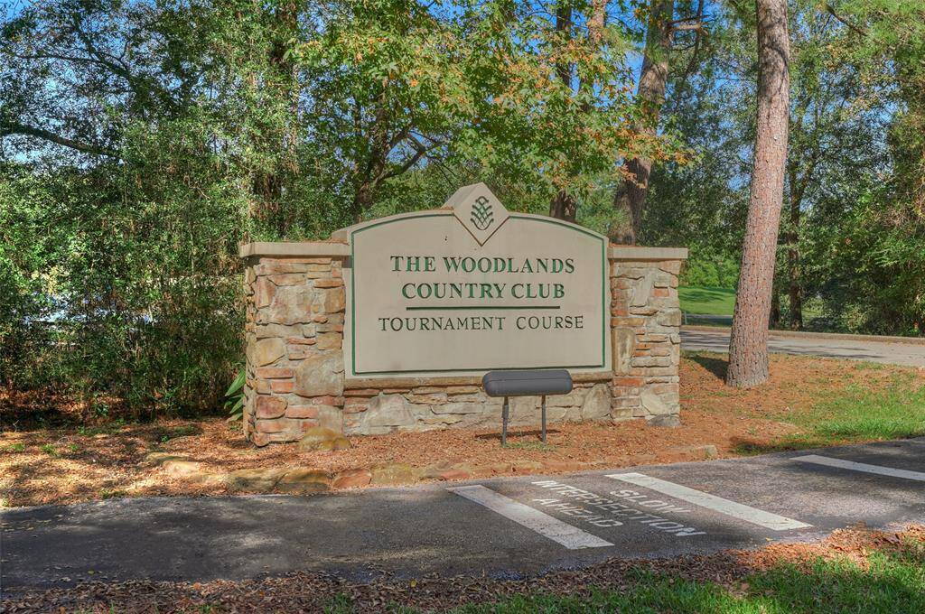 Location is unbeatable for 5 Coralvine Court. Located on the 8th hole of The Woodlands Country Club Tournament Course 8th hole.Just over 1/4 acre lot in one of theoriginal neighborhoods of Grogan'sMill.