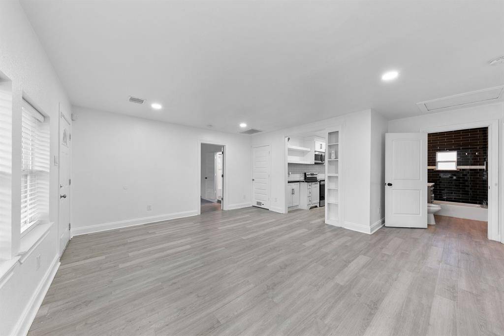 Luxury vinyl plank flooring throughout offers style and durability—elegance meets easy maintenance in every room