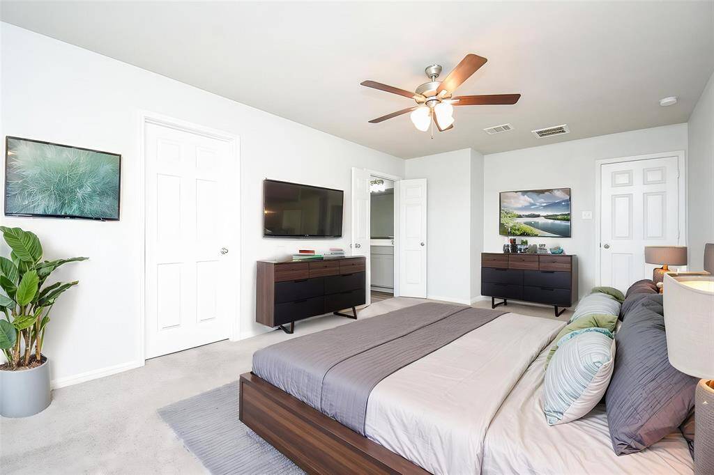 Spacious Primary Suite *Digitally Staged Photo*
