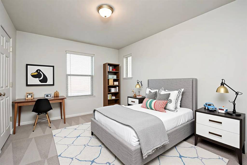 Second Bedroom with walk in closet *Digitally Staged Photo*