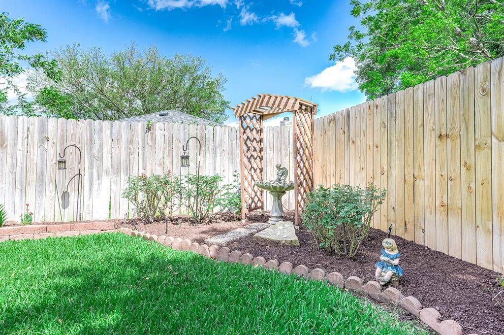 Landscaped and recently mulched.