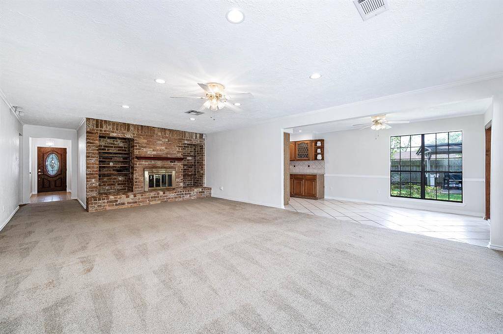Fireplace and open to dining room