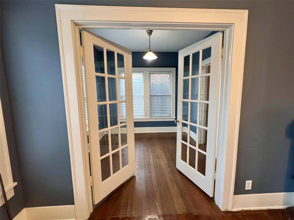 French doors open onto the extra room.