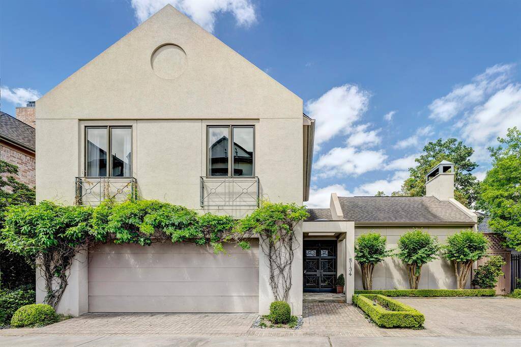 Stunning and serene, this custom built, one owner home is one of four unique properties on a gated private drive just across the street from Tanglewood.