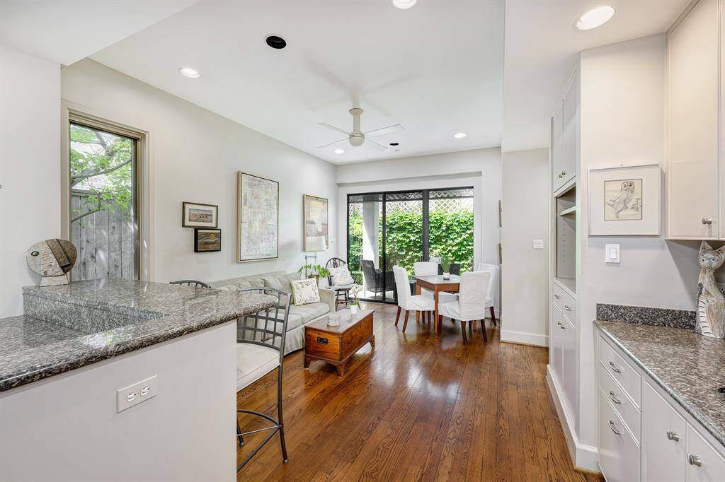 There is a lovely small patio with a covered seating area off the kitchen and sitting/tv room.