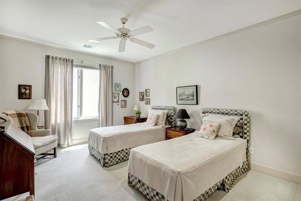 Upstairs are two spacious bedrooms with large walk in closets.