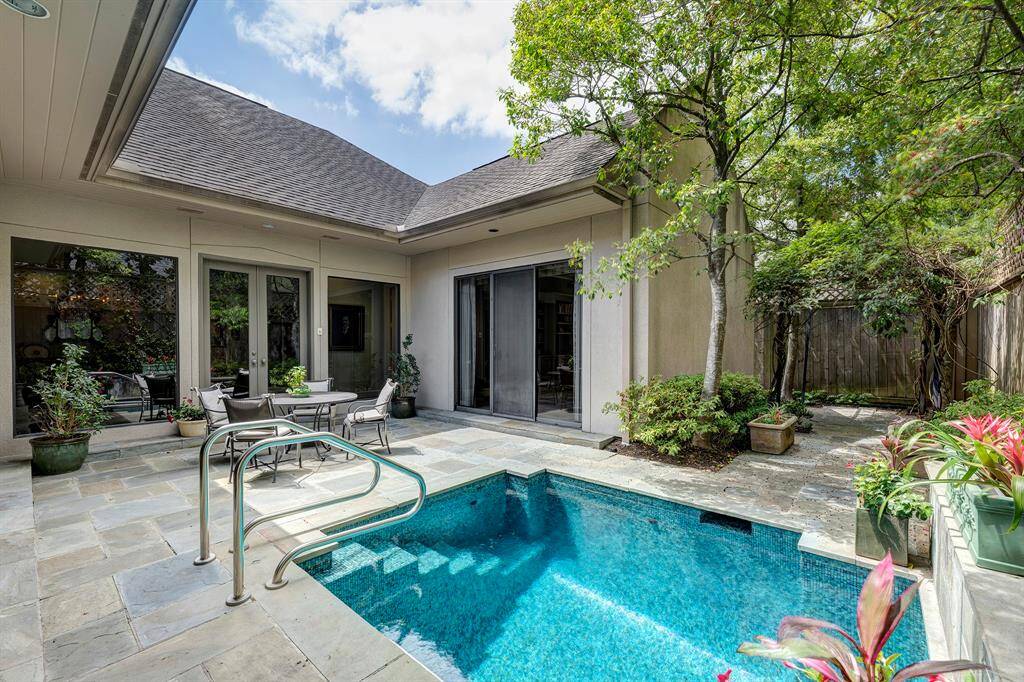 The plunge pool is visible from the living room, dining room and primary bedroom.  This area is peaceful, private and serene.