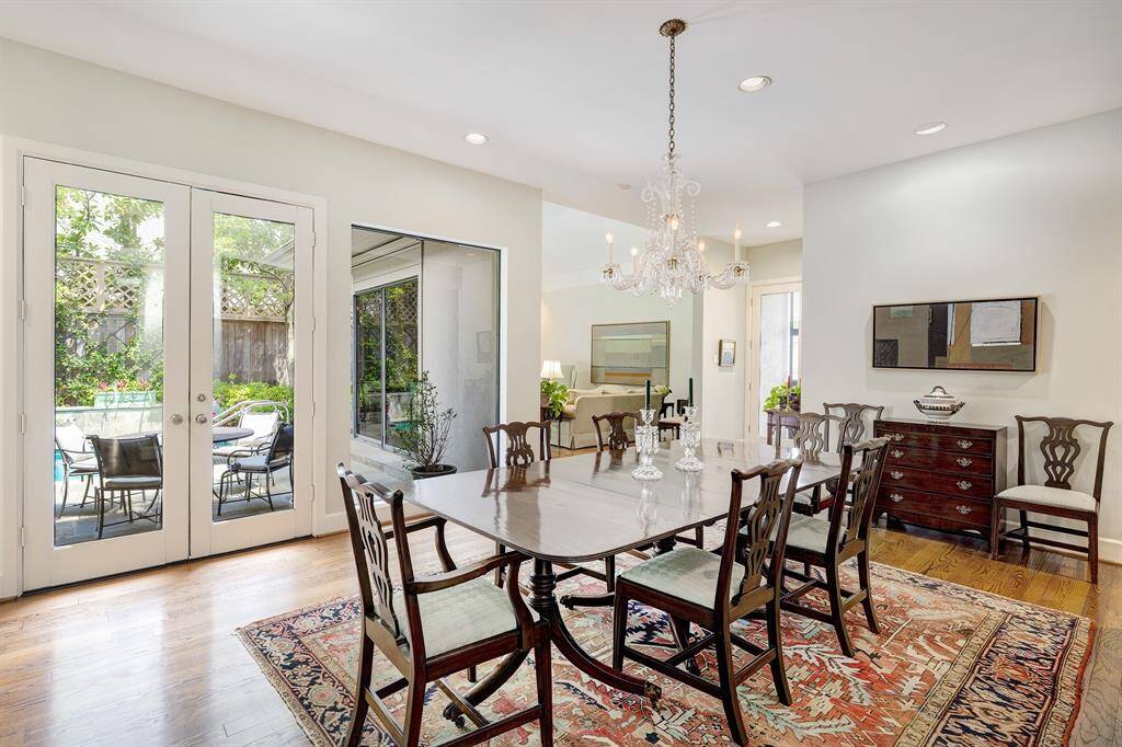 There is seamless flow from the entry and the formal living room to the dining room.