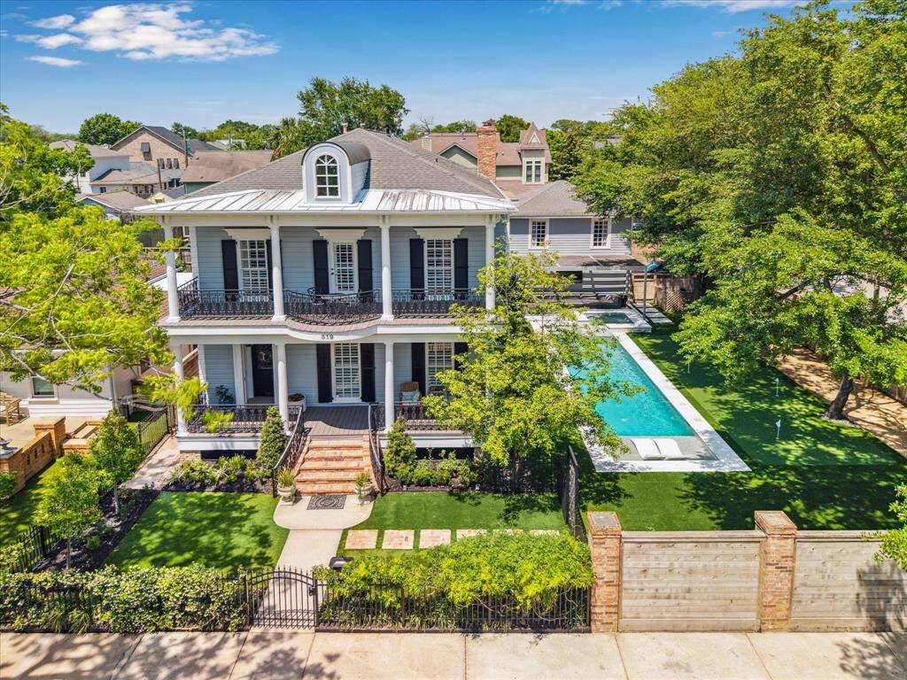 The main residence features 3,210 square feet, with a finished garage apartment bringing the total livable area to 3,672 square feet.