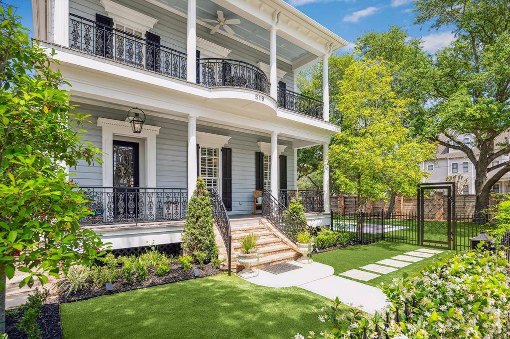 Inside, you're welcomed by a gracious foyer leading to formal living and dining rooms.