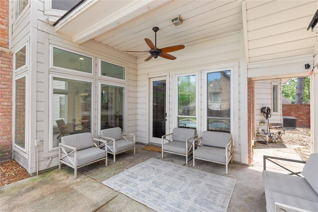 Covered porch overlooking the pool