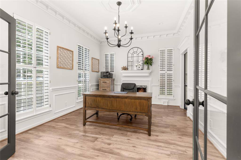 Flex room currently being used as a home office. Glass doors were recently added