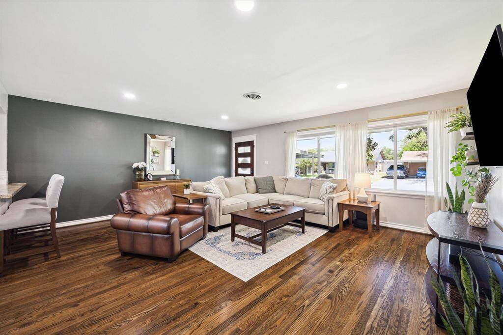 Large windows allowing for beautiful light to fill this room
