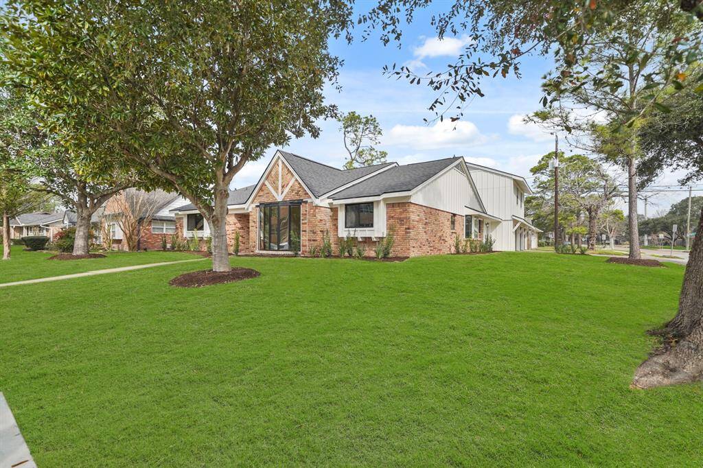 Home features an oversized 3-car garage and the triple wide driveway offers plenty of parking space.