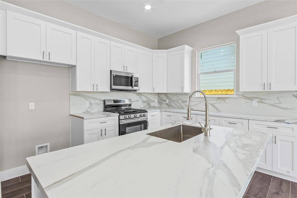 Open and spacious kitchen with loads of cabinet