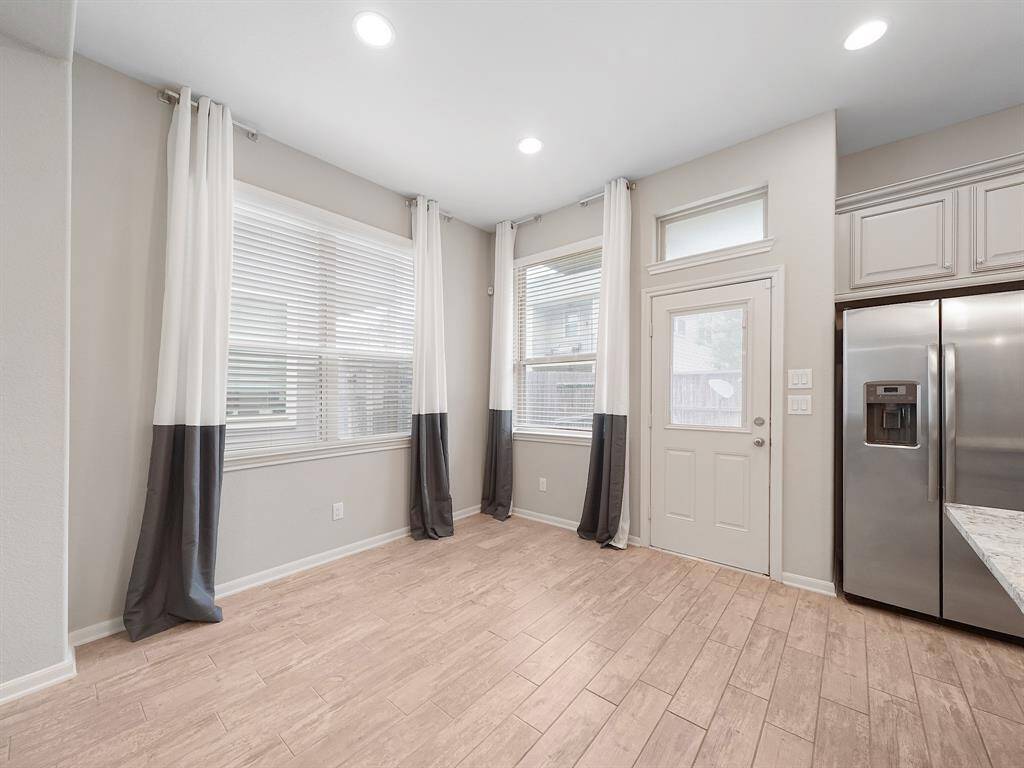 Imagine hosting memorable gatherings in the expansive dining area, perfectly situated off the kitchen for effortless entertaining.
