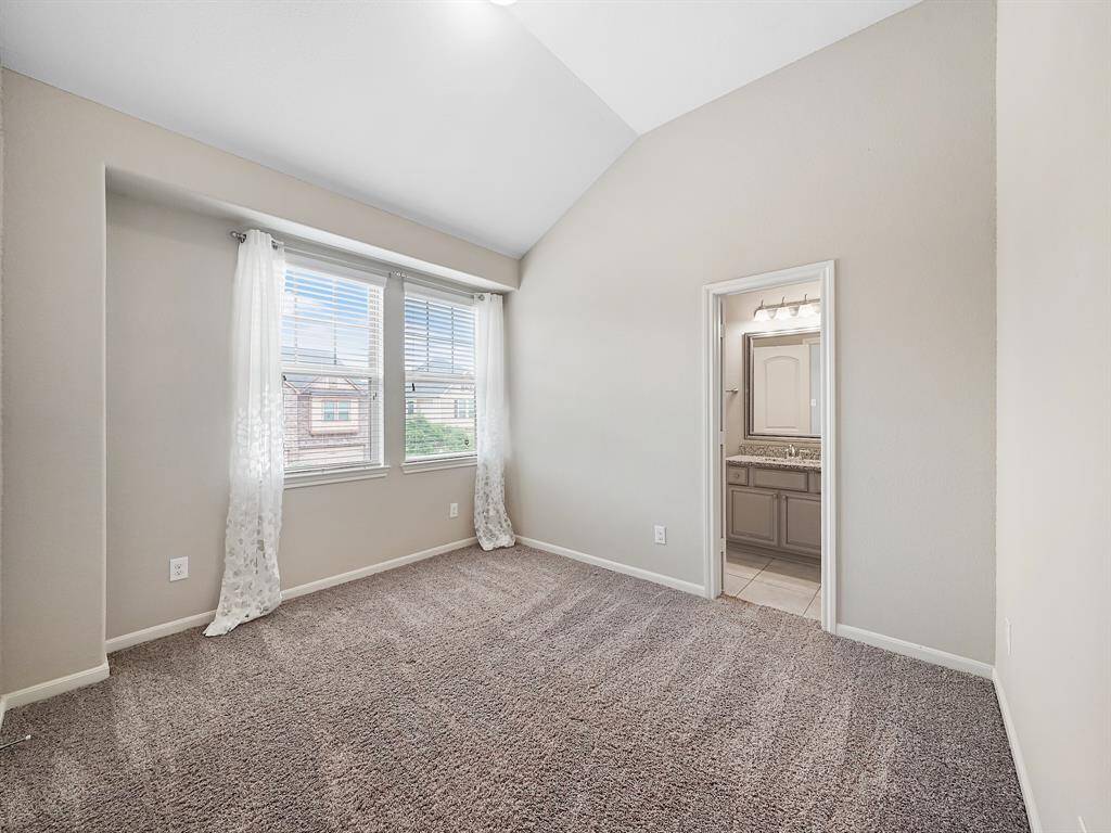 Discover comfort and convenience in our spacious secondary bedrooms. Secondary bedroom #1 boasts a soaring high ceiling and the added benefit of direct access to the secondary bathroom – perfect for guests or family members seeking privacy.