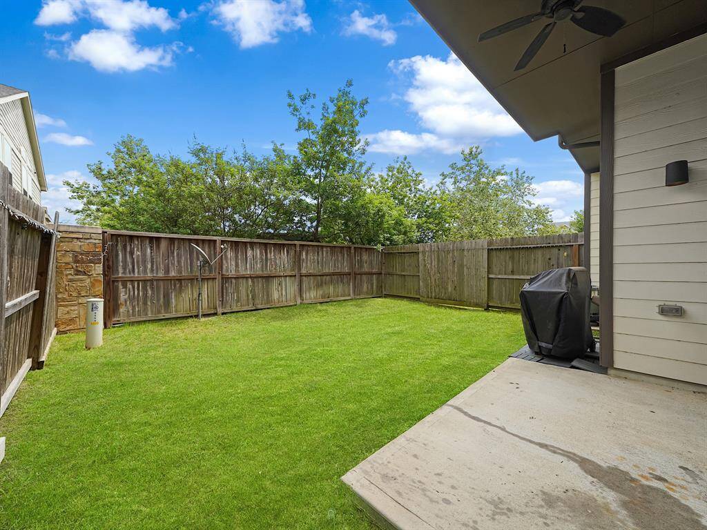 Imagine relaxing in your expansive, fenced backyard, complete with a spacious patio perfect for entertaining or simply unwinding after a long day.