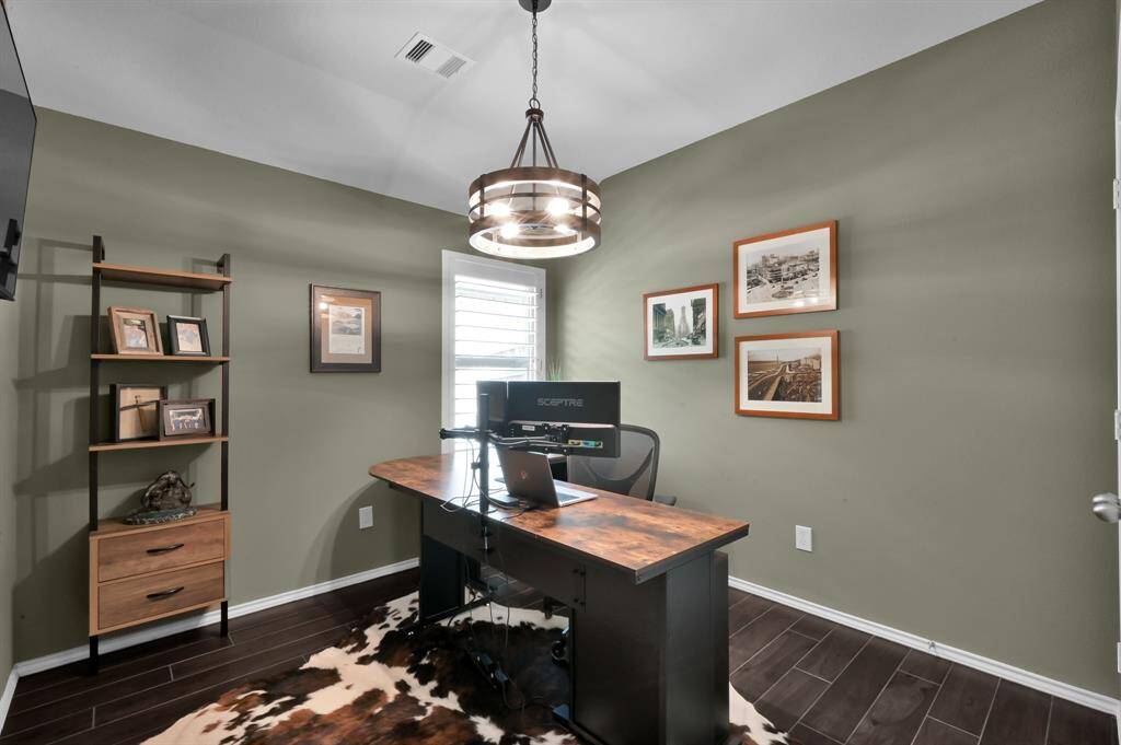 Secondary bedroom #1 is currently being utilized as an office space.