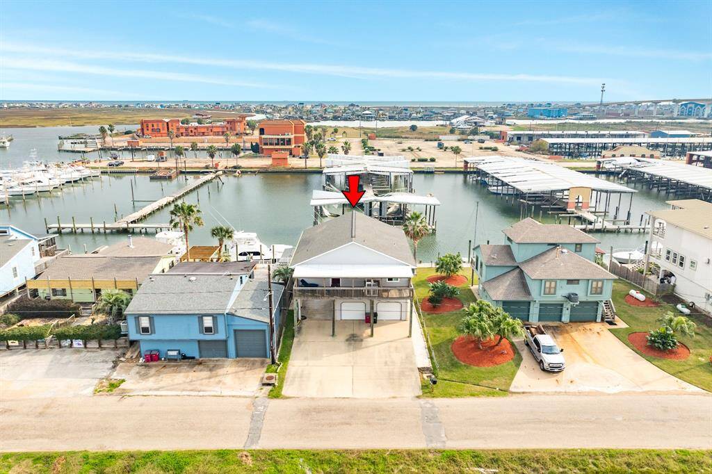 Aerial view of 56 Marlin with concrete pad and pitched roof for vaulted ceilings.