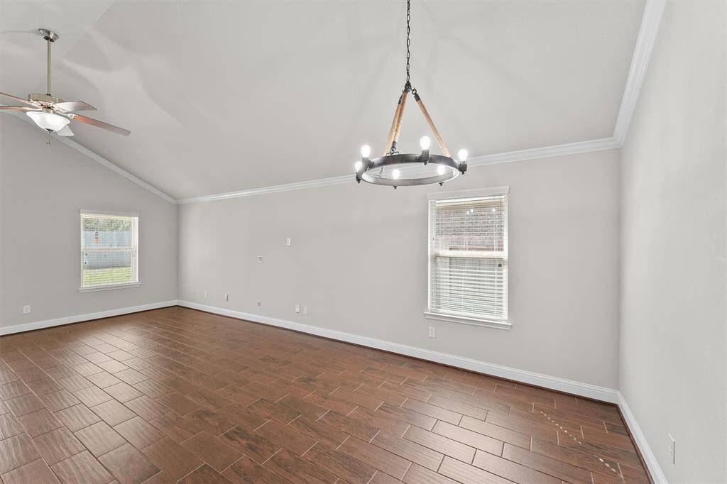 Ktichen is open to a large area that combines dining and family area.