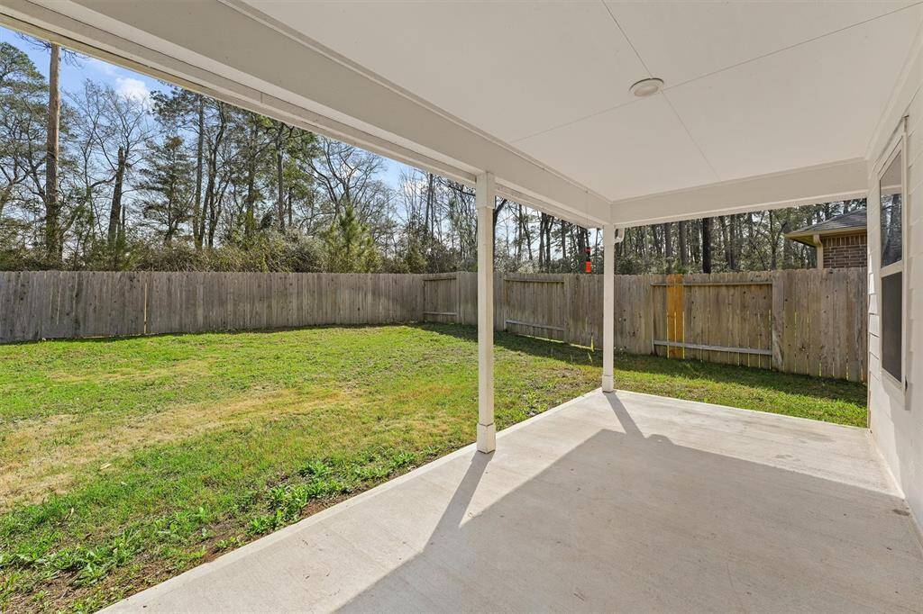 Covered patio and private backyard for your family gatherings