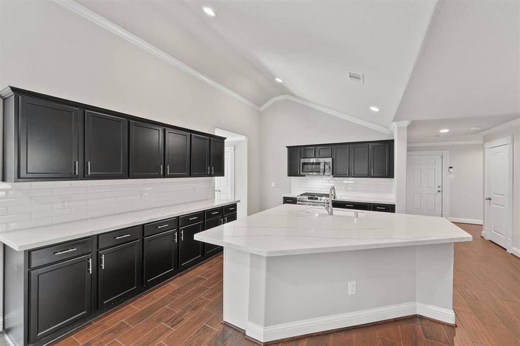Large kitchen with large island and plenty of cabinets