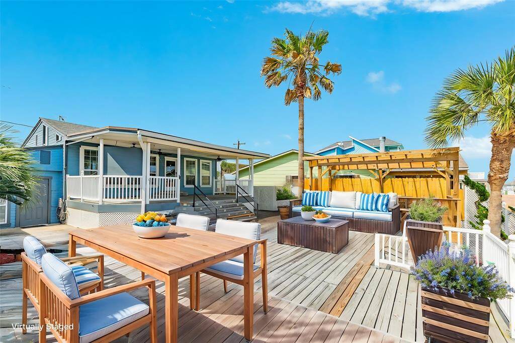Virtually staged to show outdoor seating accommodations.
