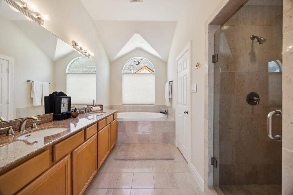 Jetted tub and shower with double vanity